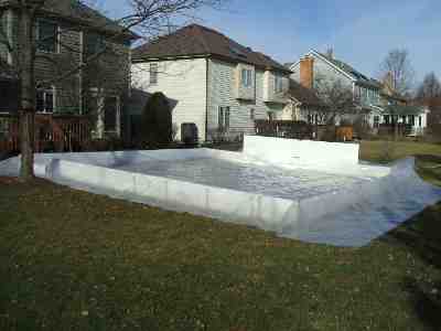 backyard ice rink using a plastic ice rink liner OR a rink tarp 