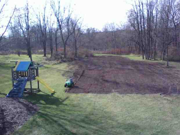 Leveling Backyard with Dozer for Backyard Rink