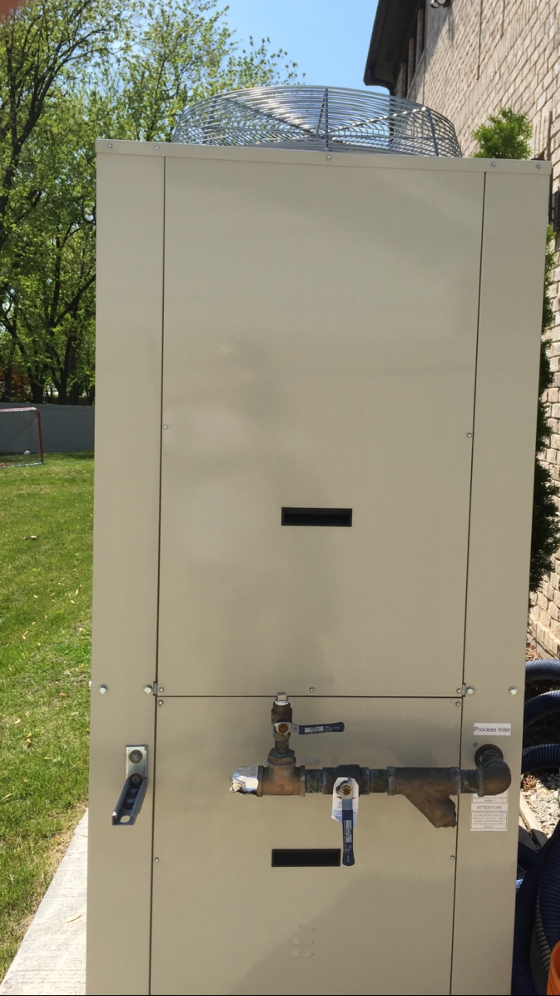 Another front view of an ice rink chiller for a  for a residential portable refrigerated outdoor ice hockey rink